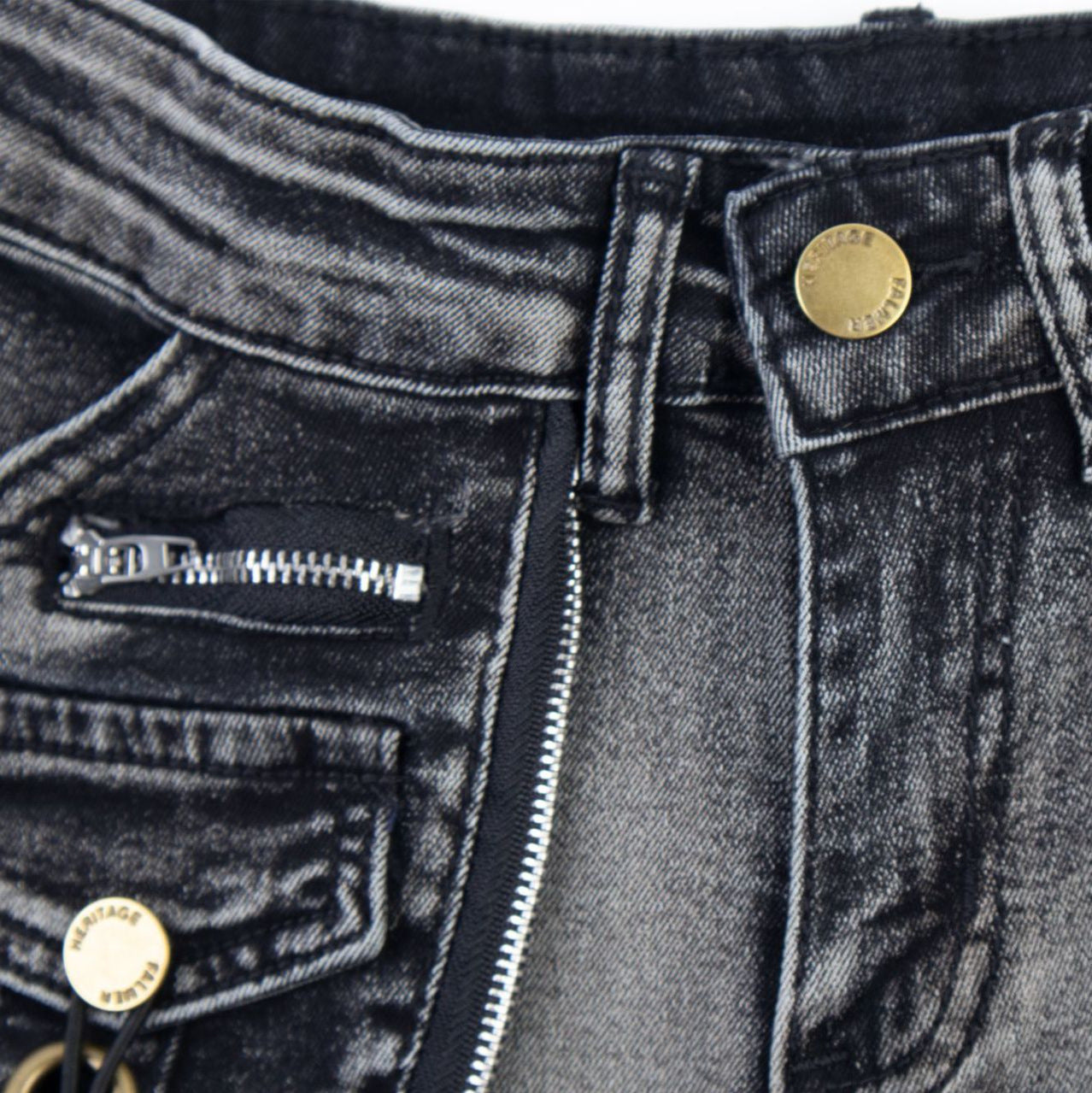 Washed and worn low rise jeans for women